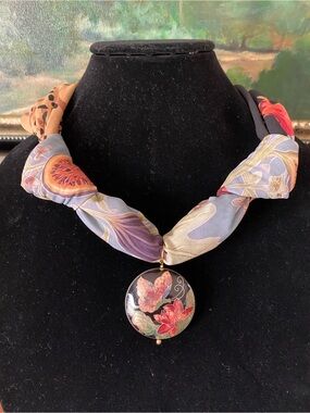 Gorgeous scarf with a vintage cloisonné round pendant.